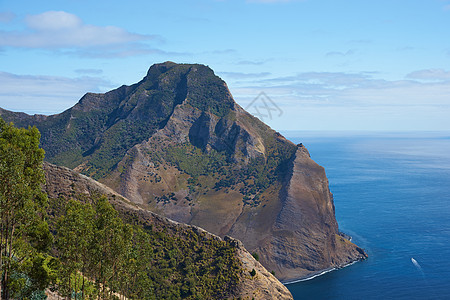 鲁滨逊克鲁索岛传奇支撑火山森林海岸爬坡绿色林地海洋图片