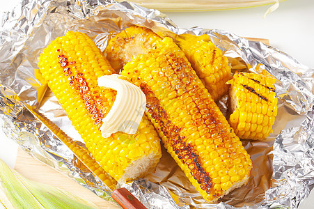 谷状玉米铝箔伴奏黄色黄油蔬菜锡纸棒子点心食物烧烤图片