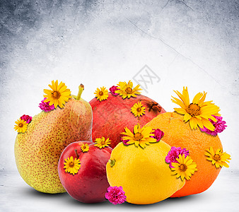 带花果的水果背景橙子柠檬灰色石榴背景图片