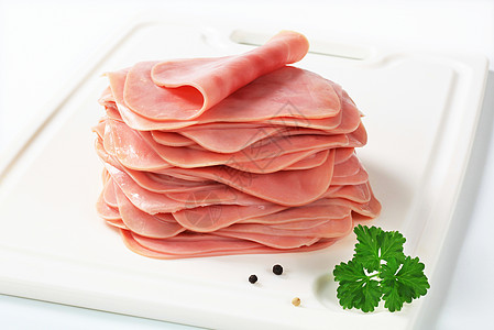 切断的火腿香菜食物熏制砧板冷盘塑料食材白色火鸡猪肉图片