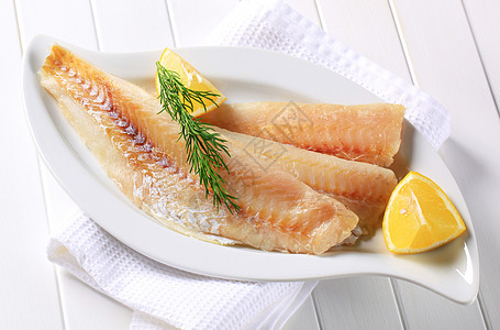 白鱼片偏斜盘子白鱼白色鱼片鳕鱼食物库存柠檬鲶鱼图片