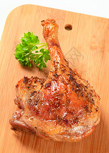 烤鸭腿鸡腿砧板鸭子食物库存皮肤家禽美味烤箱图片