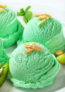 绿色冰淇淋水果楔子勺子果子食物蜜露绿茶甜点奇异果淡绿色图片