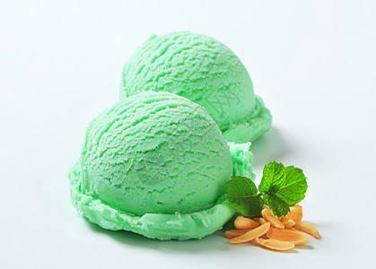 绿色冰淇淋淡绿色甜点绿茶果子勺子食物小吃蜜露背景图片