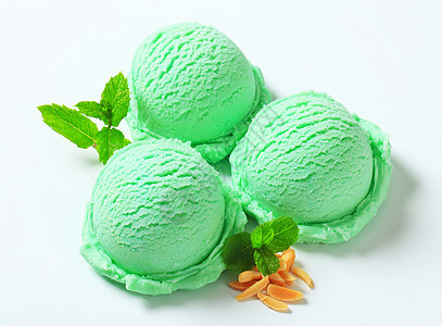 绿色冰淇淋蜜露绿茶甜点库存小吃食物猕猴桃薄荷勺子淡绿色背景图片