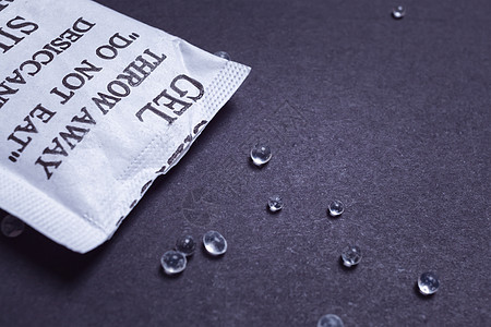 黑后脑纸袋中贴紧硅凝胶或干燥剂白色工业包装危险水分湿度打印产品图片