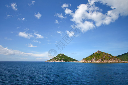 热带岛屿荒野海景太阳阳光环礁岩石海岸线天空边缘地平线图片