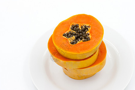 盘子里的红木瓜甜点黄色白色橙子木瓜水果营养热带食物种子图片