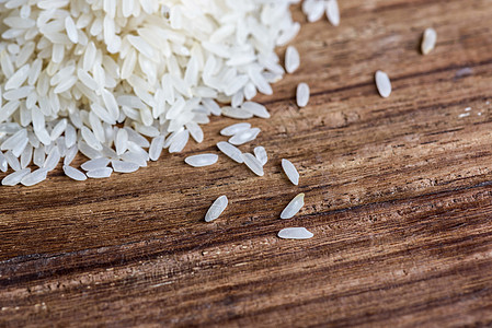 以木柴为背景的稻米木头香米美食主食谷物食物营养粮食厨房桌子图片