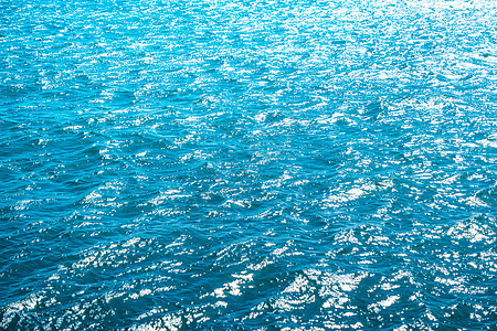 蓝色大海为背景白色水平波纹热带海浪液体海洋绿色旅行图片