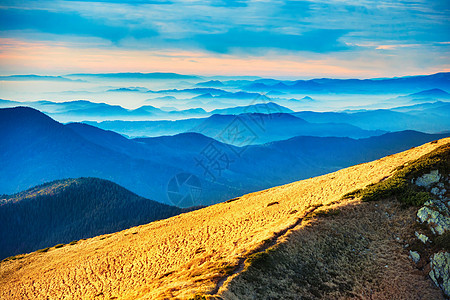 蓝山和山丘山脊橙子荒野太阳天空旅行国家日落公园山峰图片