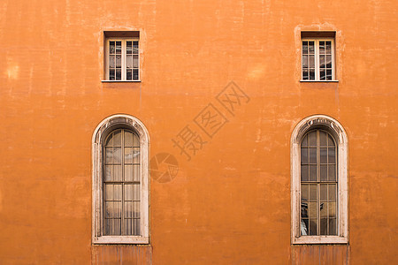 意大利罗马一栋房子的橙色外表文化街道吸引力旅游旅行假期古董首都遗产窗户图片