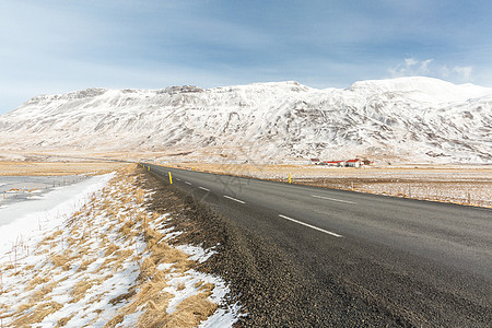 冰岛冬季景观大路森林公园旅行天空季节暴风雪天气车道蓝色图片