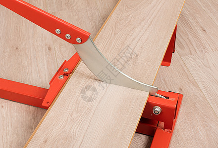 切割压层的红色工具控制板房间安装木板建筑地面木工仪表木匠刀具图片
