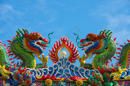 泰国中国寺庙的龙雕雕塑装饰品传统文化动物生物艺术蓝色宗教旅游火焰图片