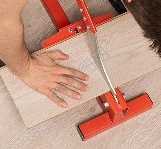 切割压层的红色工具配件木匠木头地面建筑安装改造职业维修装修图片