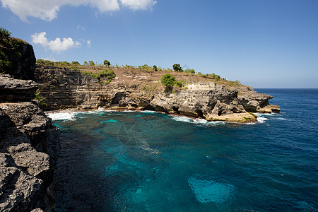 努沙佩尼达岛海岸线热带八喜晴天海洋蓝色射线旅行海岸季节岩石图片