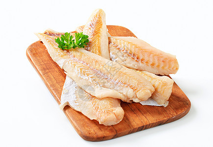 新鲜鱼片煤鱼高架鲶鱼鳕鱼熏制库存白鱼食物砧板图片