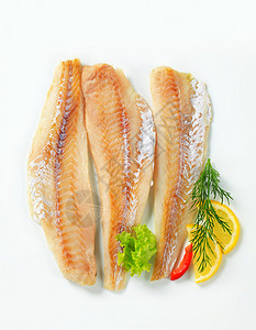 白鱼片鳕鱼鲶鱼食物库存鱼片白鱼柠檬高架熏制煤鱼图片