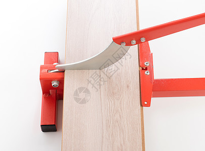 切割压层的红色工具工作木地板木板改造维修安装承包商木匠职业地板图片
