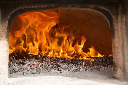 木柴炉灶温度烹饪燃烧烧伤红色火焰餐厅食物壁炉木头图片
