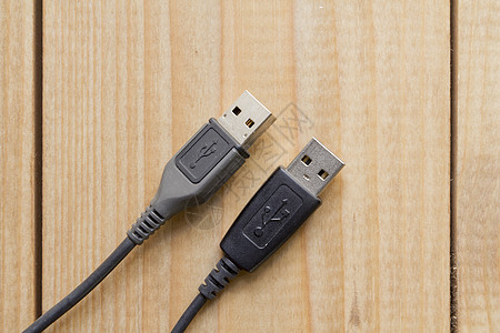 计算机电线数据黑色连接电缆贮存硬件电子产品口袋插头木头图片