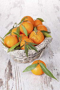 普通水果 华丽的风格叶子乡村篮子柑桔橙子树叶热带反射食物图片