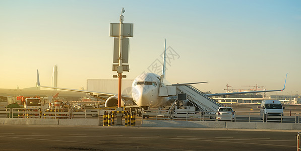 机场飞机跑道运输喷射太阳日落旅游梯子宪章空气涡轮图片