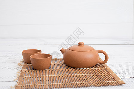 茶汽茶黏土用具杯子制品木头桌子陶器仪式陶瓷商品图片