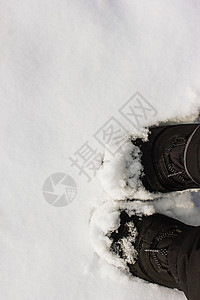 雪中的靴子运动雪花游客旅行滑雪蓝色脚印登山者裤子鞋类图片