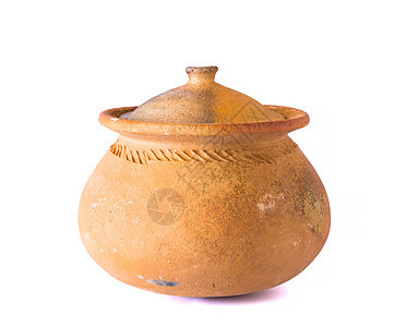 用粘土做的锅子在厨房里用工具烹饪炊具家庭手工古董火炉烤箱植物陶器图片