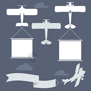带有空白问候横幅的双翼飞机图片