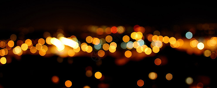 夜间城市照明街道黄色背景灯光图片