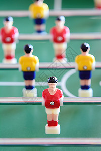 表桌足球足球竞赛塑料绿色黄色玩家玩具塑像团队运动桌子图片