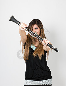 带单簧管的妇女乐器演奏家黑色演员玩家学生白色艺术家女士音乐家图片