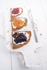 早餐面包和果酱小吃食物白色唤醒活力外套水果营养力量黄油图片