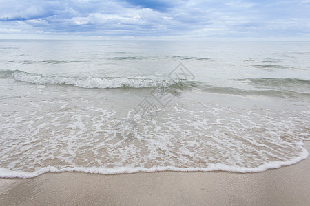 波浪与海滩海景海浪蓝色海岸泡沫冲浪情调旅行热带假期图片