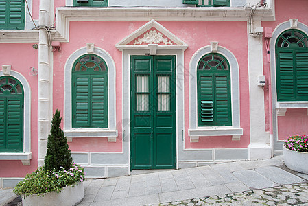 以粉红色葡萄牙风格和古董形式建造的传统象牙屋房子建筑房屋港口景观城市蓝色市中心街道粉色图片