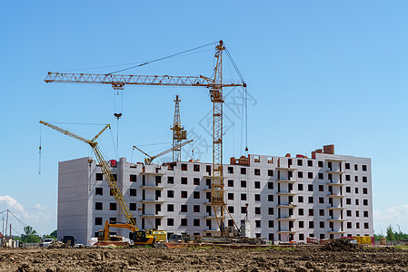 建造一座多层建筑 Cranes工程高楼建筑工程师住宅黏土建设者工具平板晴天挖掘机图片