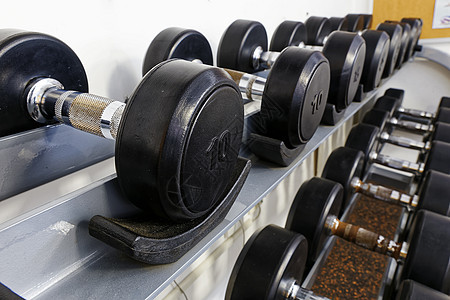 运动哑铃锻炼重量权重架子商业建筑举重学校肌肉健身房图片