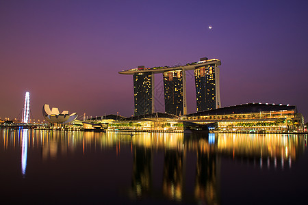 新加坡鱼尾狮日落反射商业建筑城市酒店旅游建筑学码头图片
