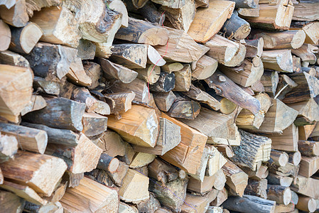 堆积成堆的干砍柴木木木活力损害材料森林环境燃料柴堆木材硬木烧伤图片