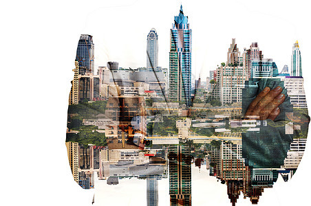 商务人士与城市建筑的双重曝光图片