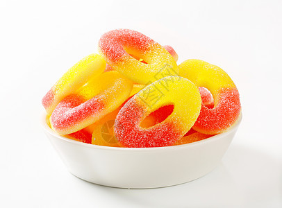 软糖环小吃红色明胶戒指糖果黄色水果味盘子甜点白色图片