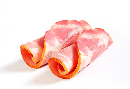 烟熏猪肉切片     卷起来食物小吃熏制火腿冷盘图片