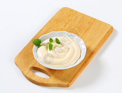 沙拉酱敷料扩散调味品盘子砧板白色奶油奶制品食物库存图片