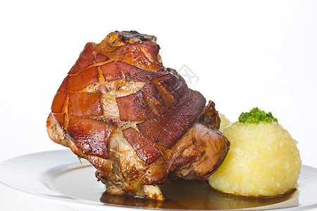 猪肉加马铃薯包子肉汁小麦餐厅皮肤盘子香葱传统沙拉酸菜啤酒图片