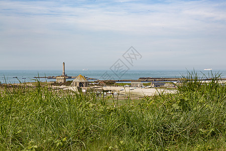 美丽的法国诺曼底海岸线蓝色环境天空岩石季节波浪石头风景旅游假期图片