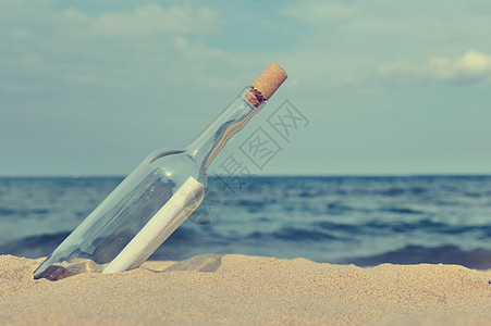 瓶中来自海洋的信息蓝色海岸抛弃旅行邮件玻璃软木热带海滩秘密图片