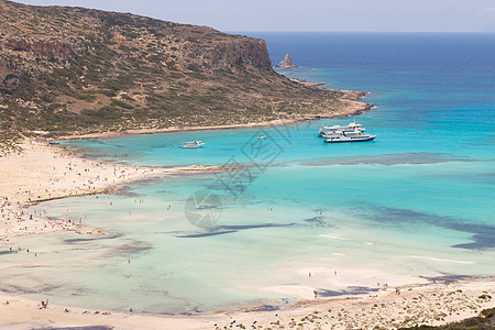 希腊克里特岛Balos海滩假期海岸线游客游泳者风景目的地天堂蓝色海洋全景图片